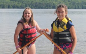 girls canoeing 